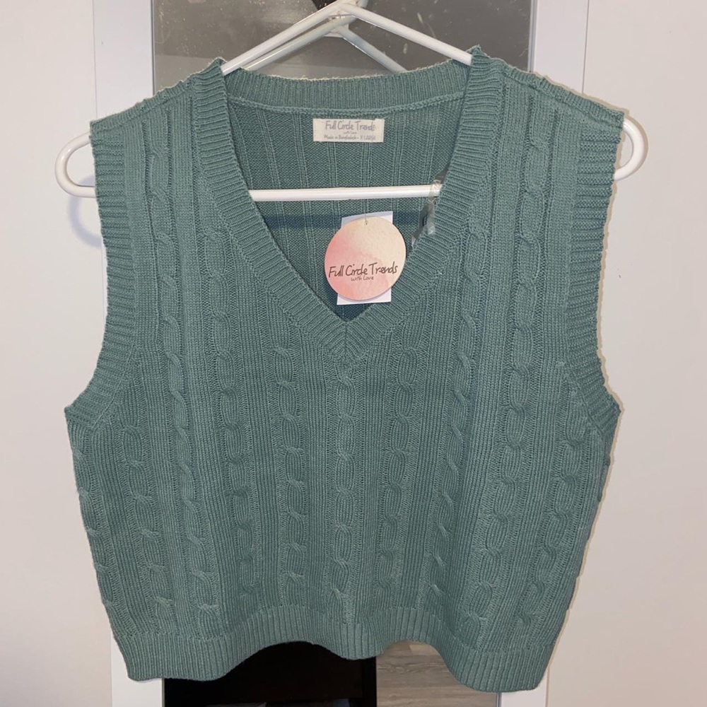 green sweater vest